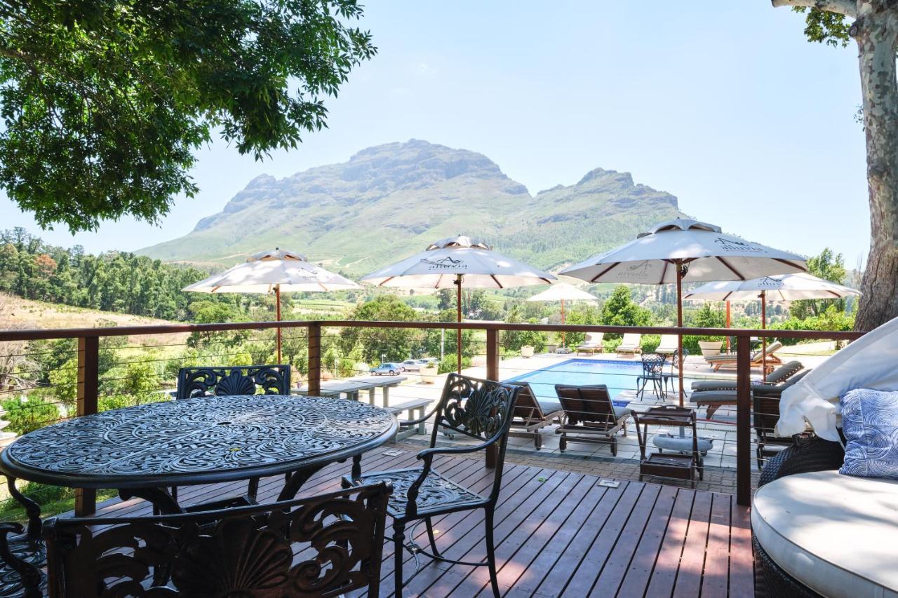 Alluvia Boutique Winery & Luxury Accommodation Stellenbosch Kültér fotó View of the Three Sisters from the deck of the restaurant at the Boschendal Wine Estate